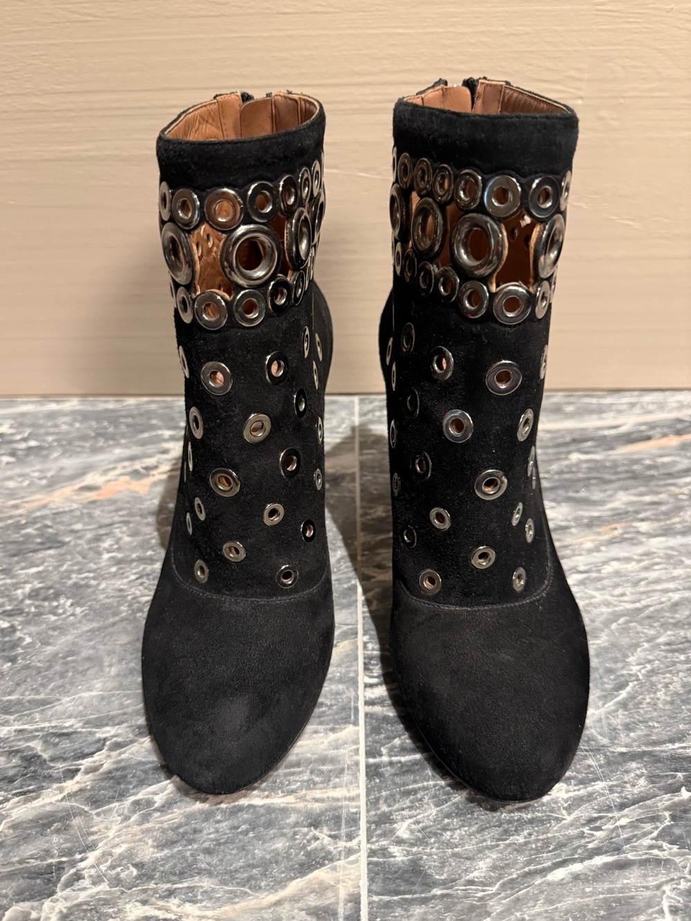 Alaia Black Suede Ankle Boots with Metallic Eyelet Detail